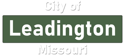 A green sign that says city of leadington missouri on it.