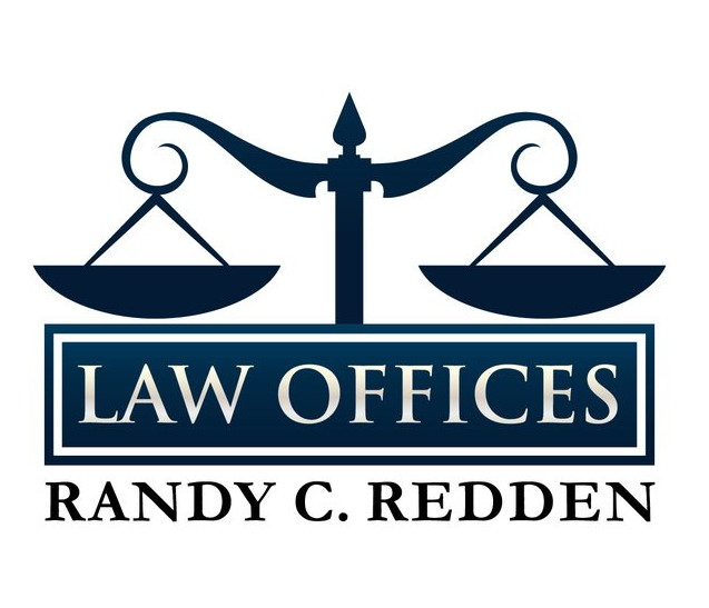 The logo for randy c. redden law offices