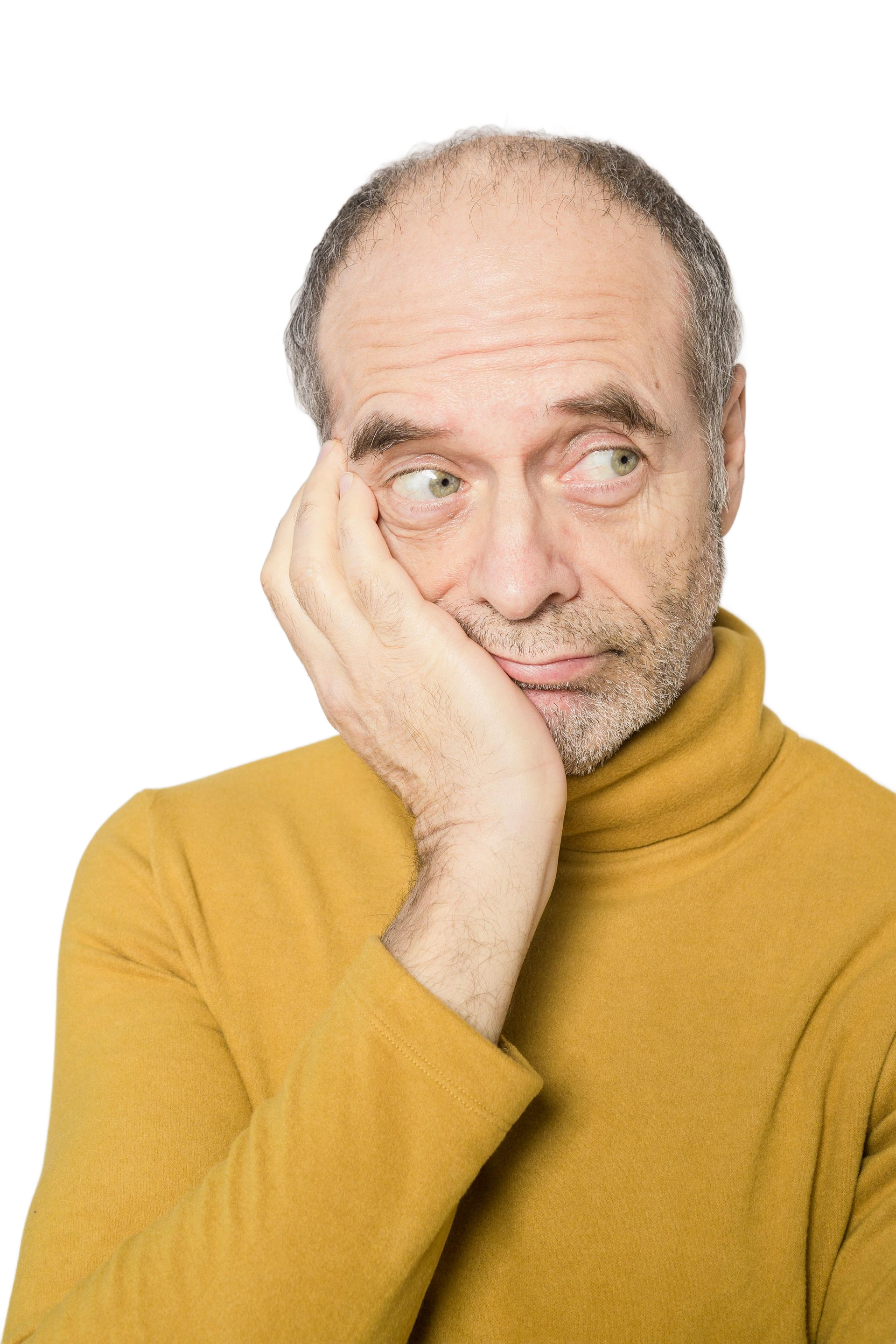 A person is holding a credit card in their hand.