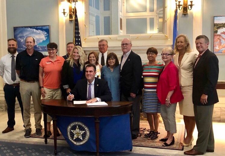 Governor Kevin Stitt signs order for OKTF specialty license plate