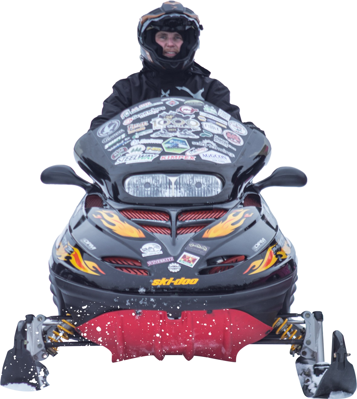 a man is riding a snowmobile in the snow