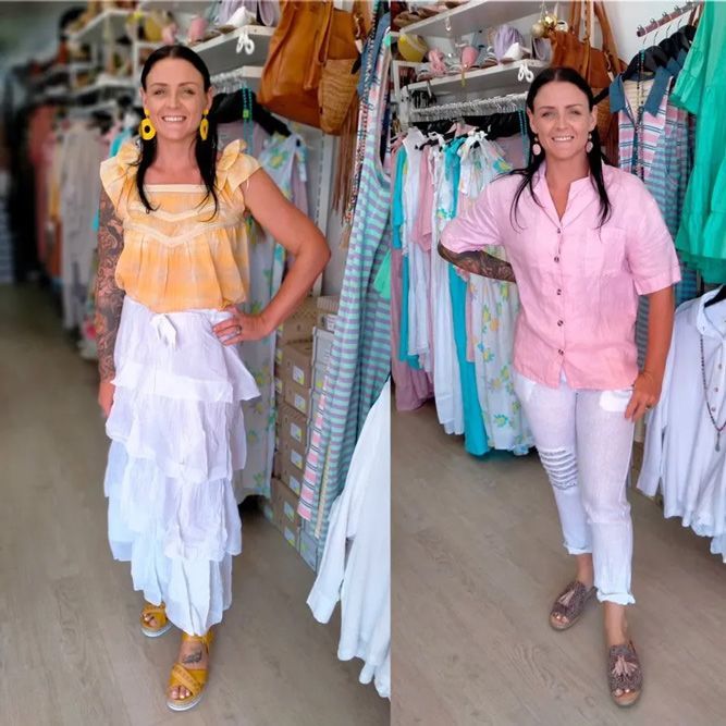Woman Wearing Sleeveless Tops With Skirt And Pink Polo With White Pants — Zest Boutique in Yeppoon, QLD