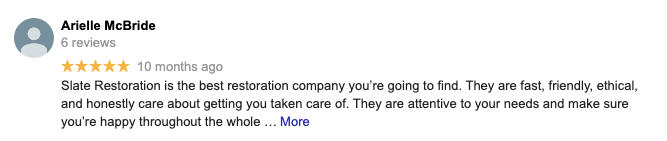 A blurred image of a person 's review on a website.
