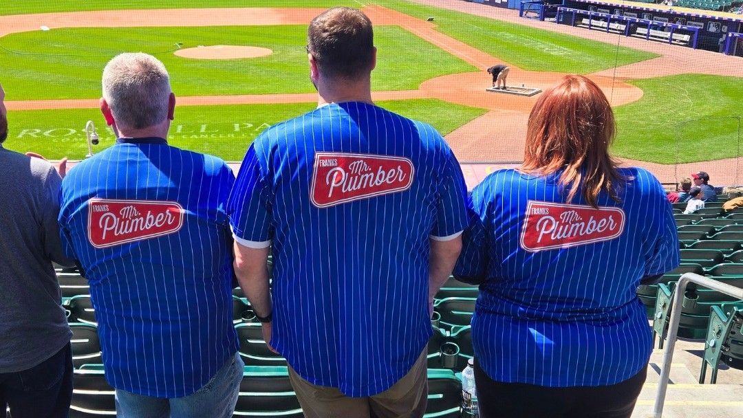 franks mr plumber team at baseball game