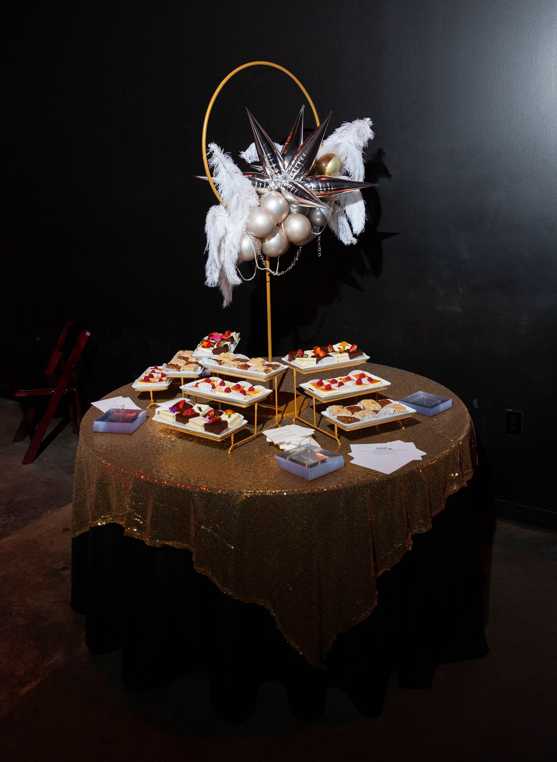 A table with a bunch of desserts on it