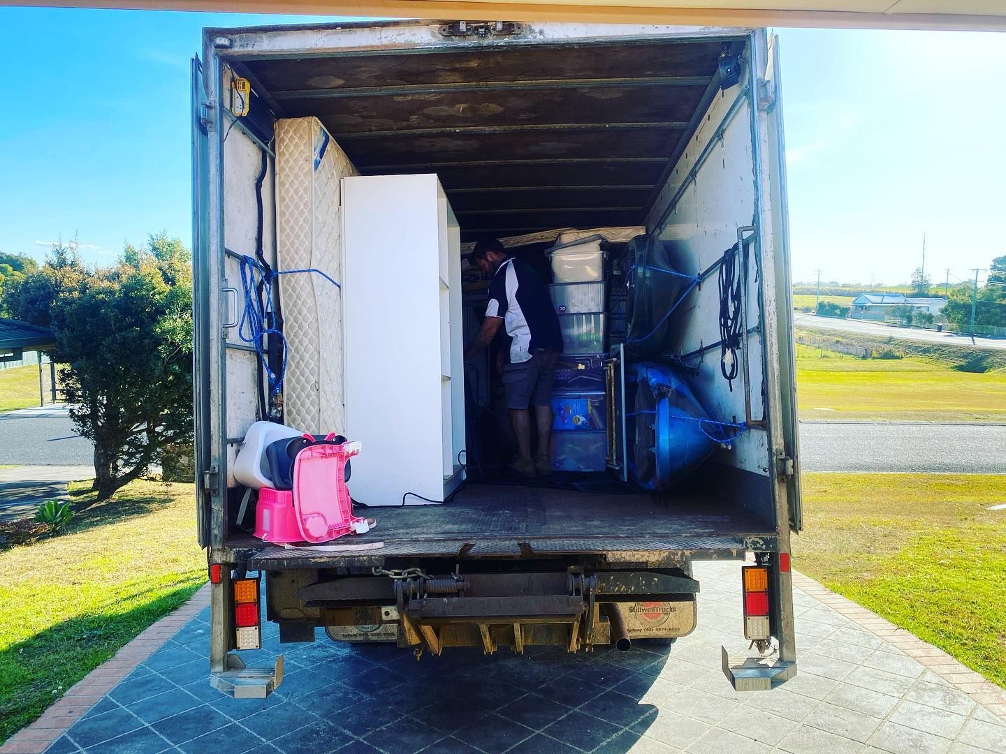 Removalist in Laurieton unloading a removalist truck