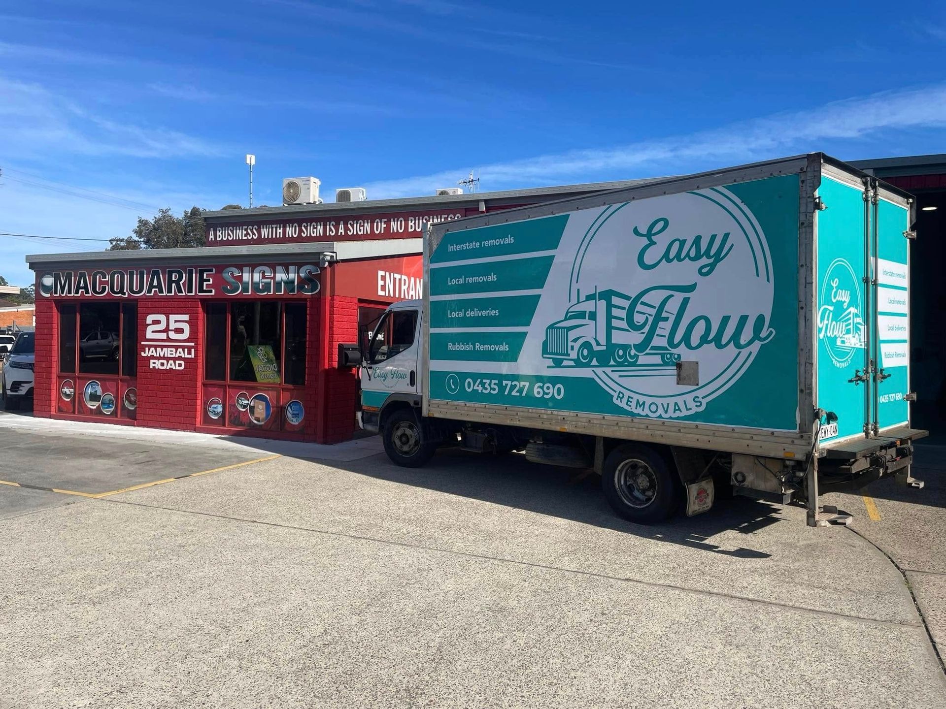 Green and White Easy Flow Removals Truck In Port Macquarie, NSW
