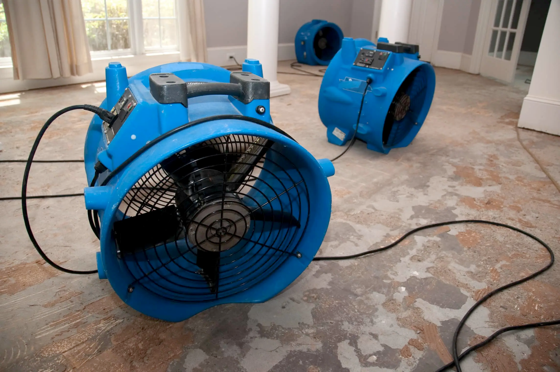 Water damage restoration equipment including air movers and dehumidifiers used in Marietta, GA.