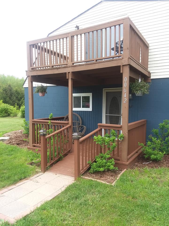 Photo of our duplex east entrance prior to an exterior renovation.