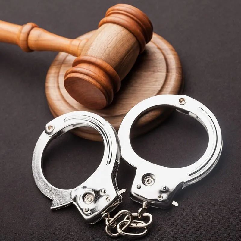 Wooden Gavel And Handcuffs Symbolising Justice And Law