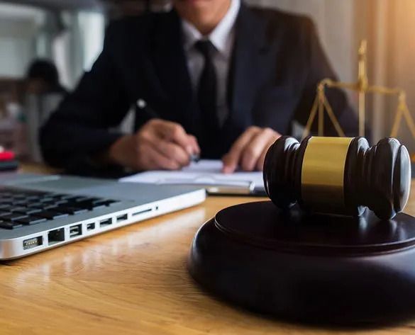 Criminal Lawyer's Gavel and Handcuffs — Anderson Telford Lawyers in Townsville, QLD