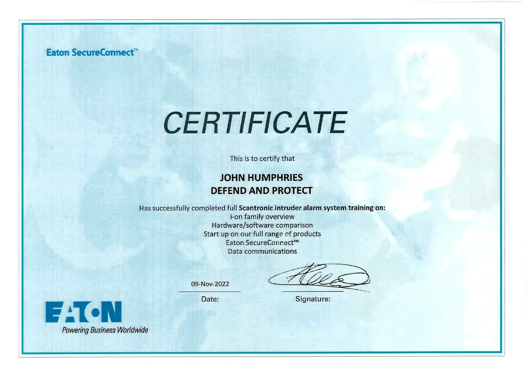 Blue Eaton corporate certificate with centered title and signature on a white background