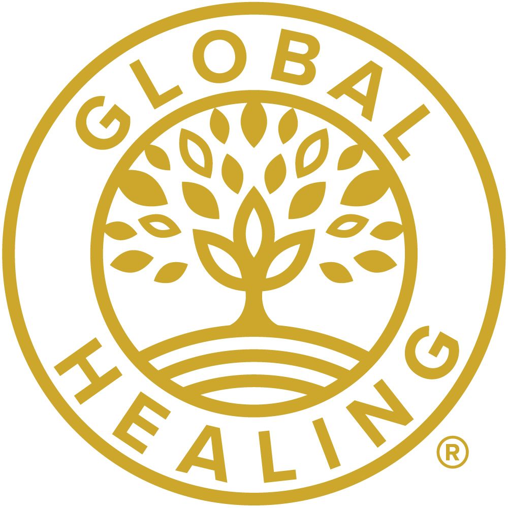 Global Healing gold circular logo with tree and leaves