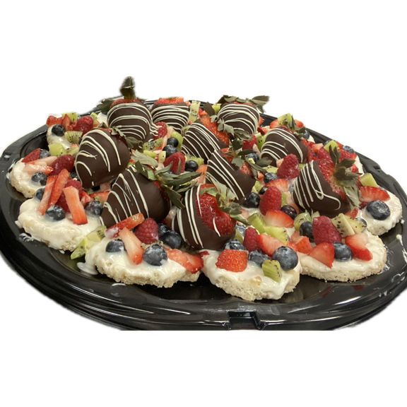 A tray of desserts with chocolate covered strawberries and blueberries on a white background.