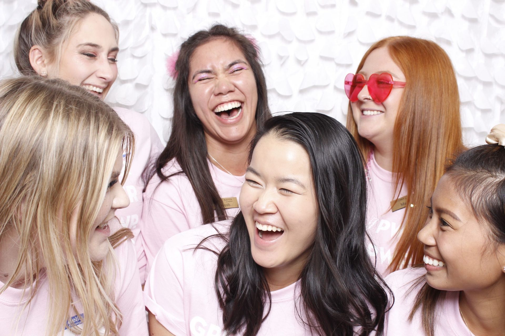 an image of smiling and laughing group of friends