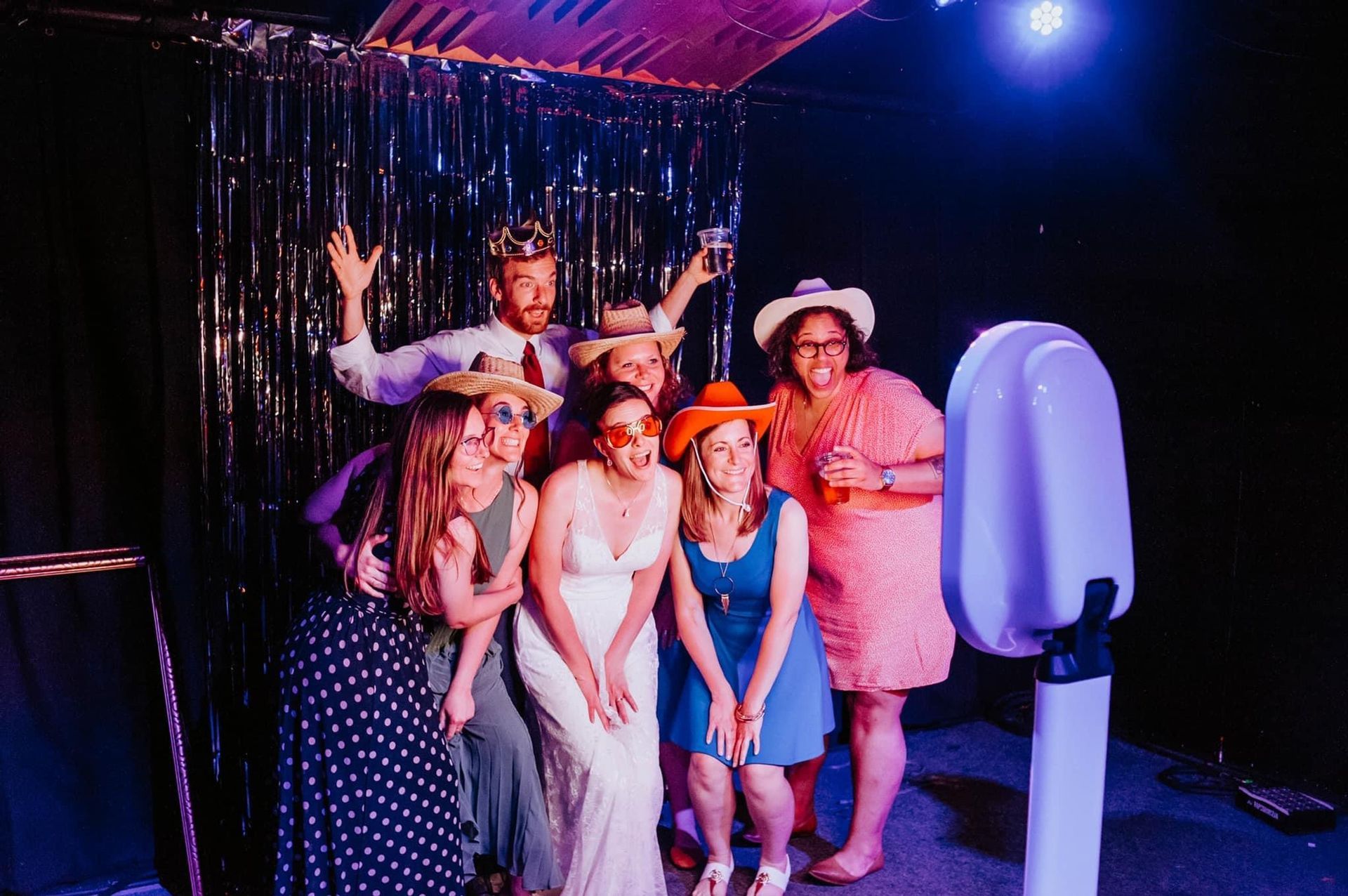 group of friends in a photo booth rental