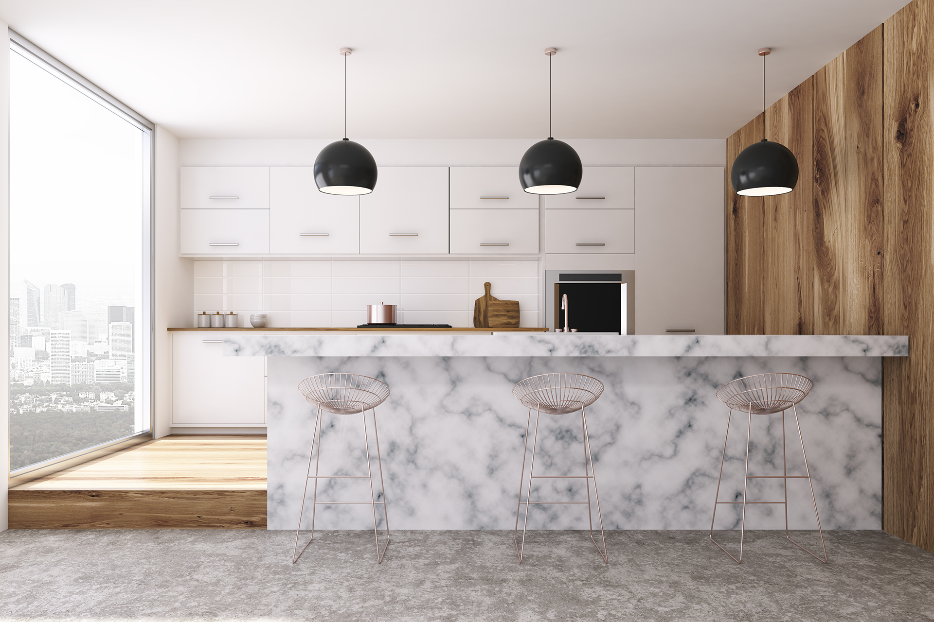 Modern kitchen with marble island, wood accents, three black pendant lights, and city view.