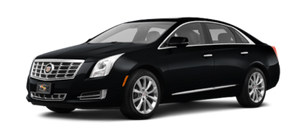 A black Cadillac XTS luxury sedan shown from a front-quarter angle on a white background.