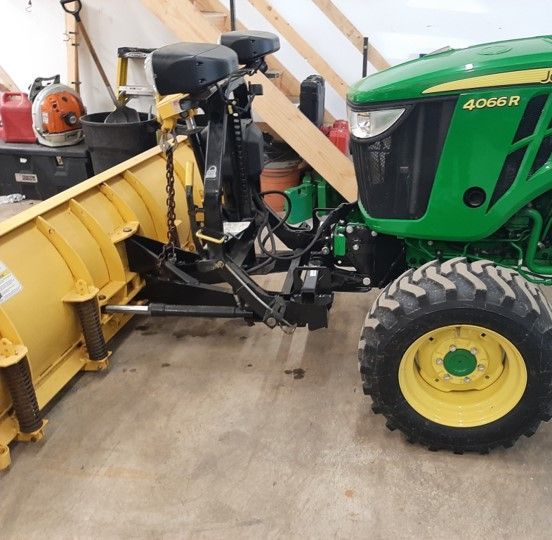 Fisher Snow Plow as an attachment for John Deere Tractor 4066R