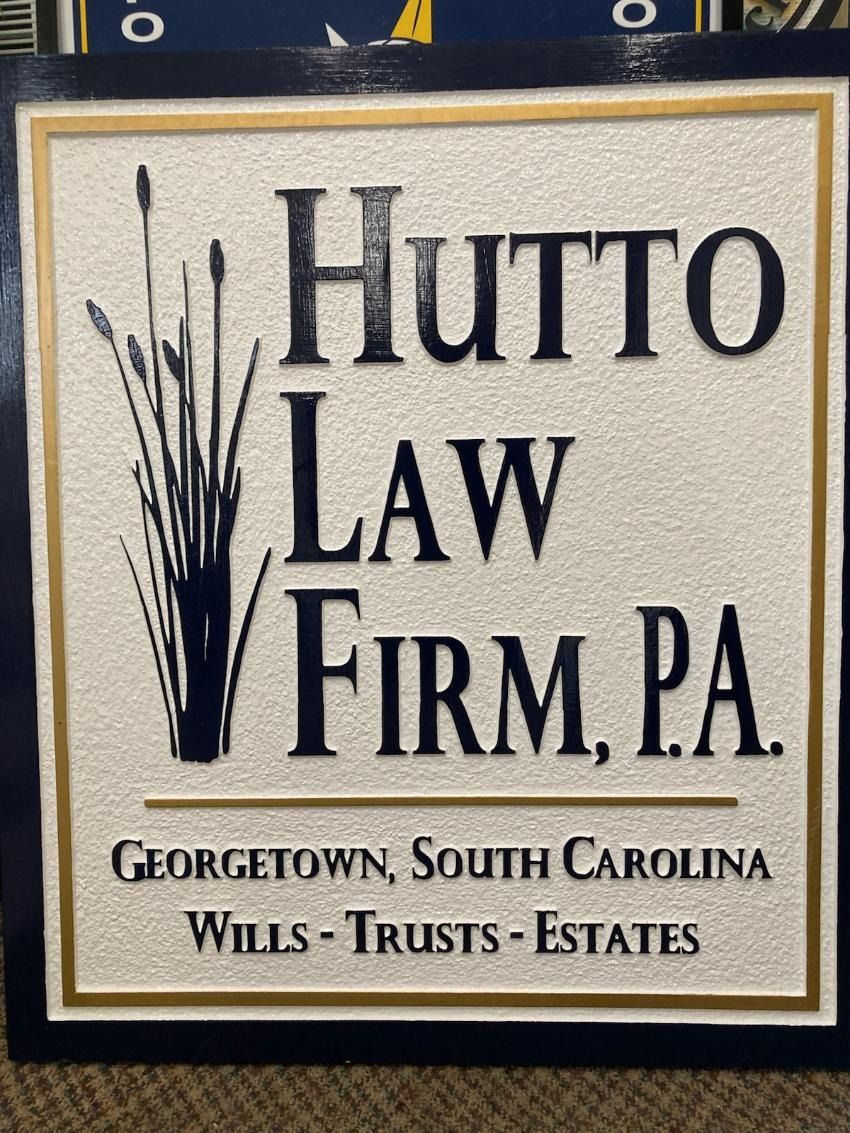 Hutto Law Firm, P.A. sign with Georgetown, South Carolina and Wills, Trusts, Estates text