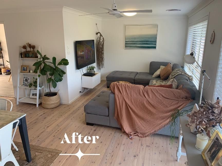 Living Room With Grey Sectional — Custom Floor Sanding In Somersby, NSW