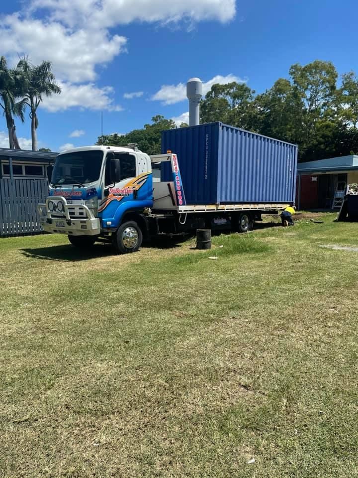 Blue Cargo Truck With a White Cab Parked — Southern Cross Tilt Trays in Rockhampton, QLD