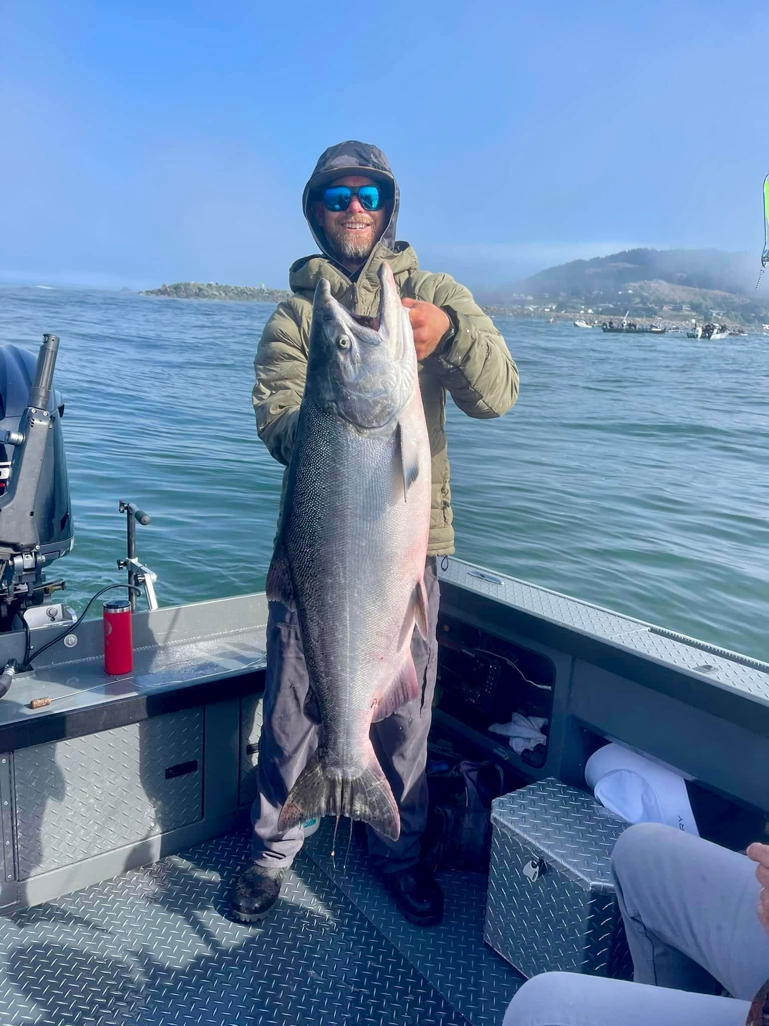 a person holding a big fish