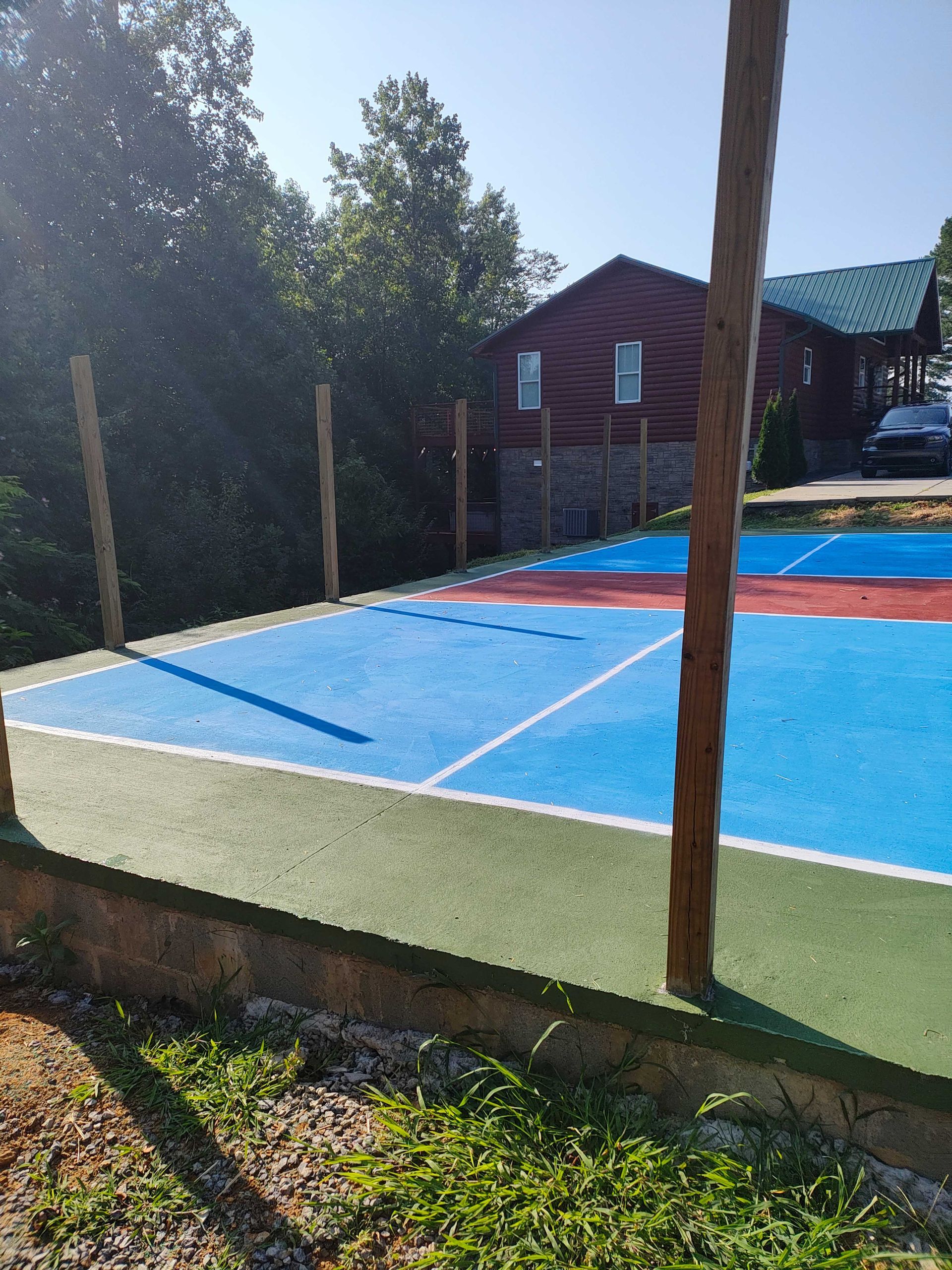 Court With A House In The Background — Knoxville, TN — DABZ CO LLC Electrical & Building Contractors