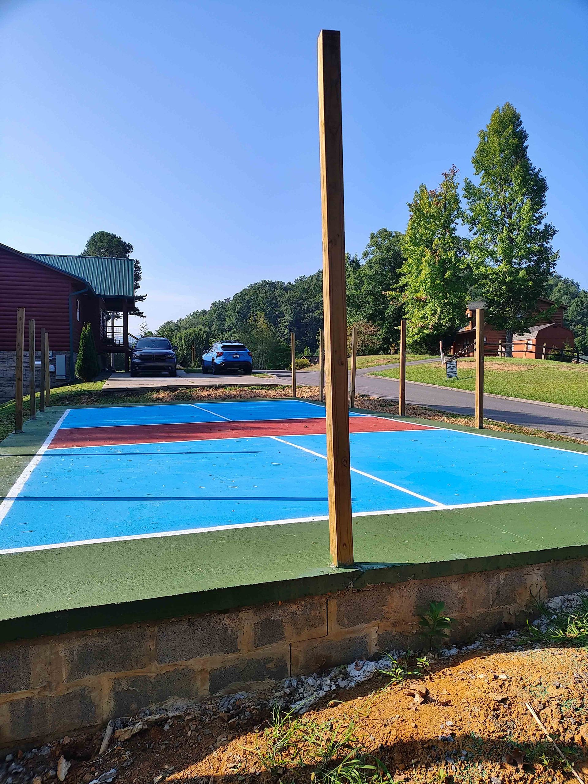Red And Blue Concrete Floor — Knoxville, TN — DABZ CO LLC Electrical & Building Contractors Red And Blue Concrete Floor — Knoxville, TN — DABZ CO LLC Electrical & Building Contractors
