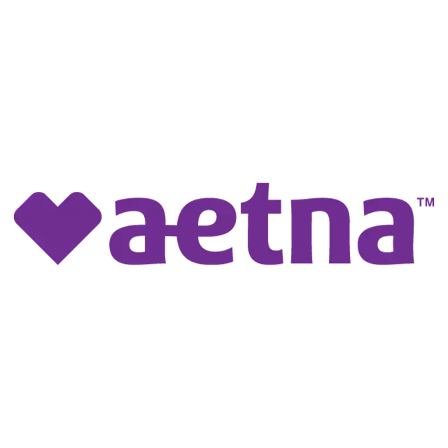 Aetna logo: purple heart symbol next to the word
