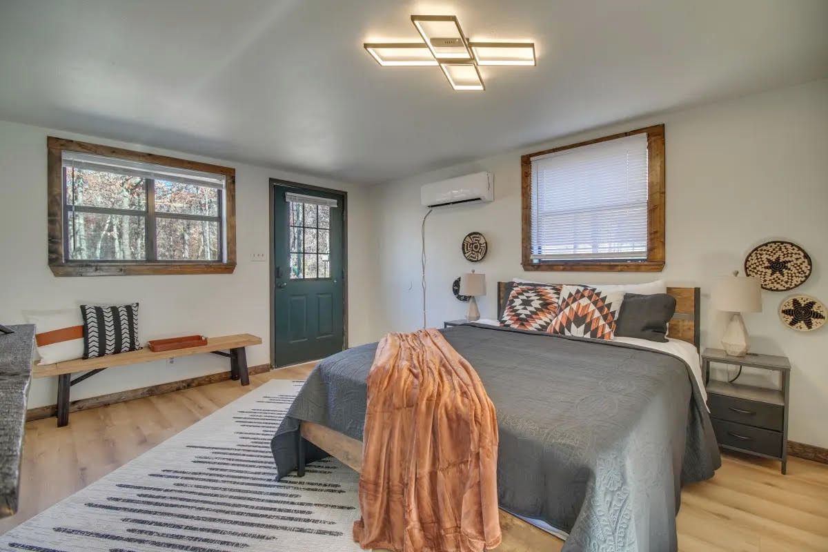 There is a large bed in the middle of the room.