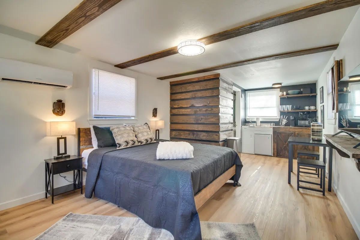 There is a large bed in the middle of the room.