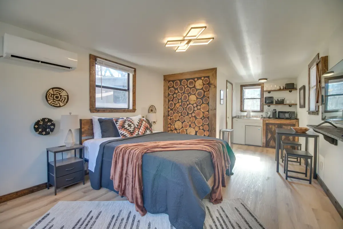 There is a large bed in the middle of the room.