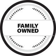 A black and white circle with the words `` family owned '' written inside of it.
