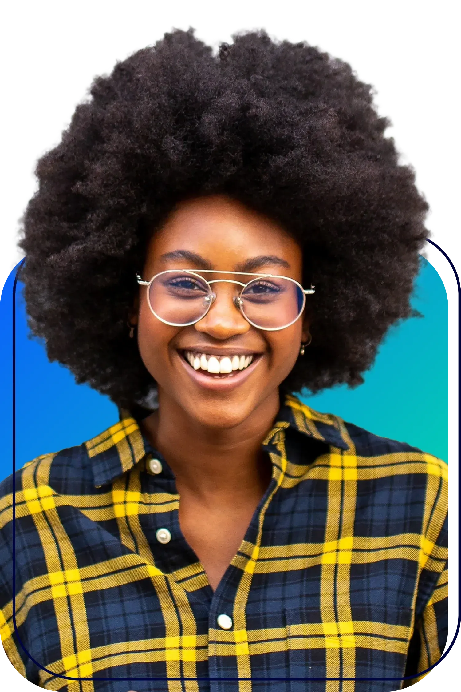 Smiling person with an afro and glasses wearing a yellow plaid shirt on a bright blue background