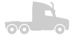 Silhouette of a semi-truck with a long flatbed and a cab with a chimney-like exhaust stack.