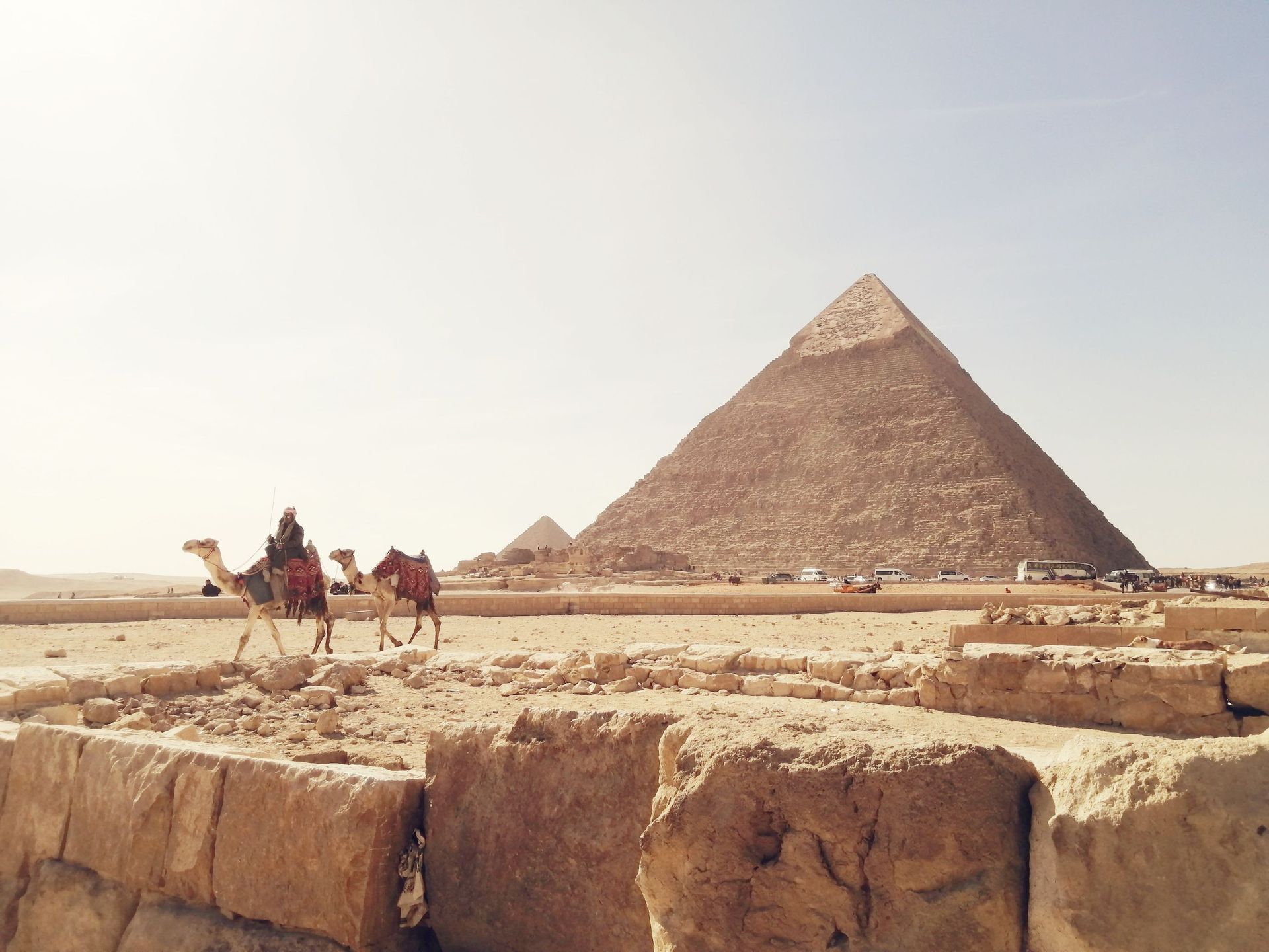 Great Pyramid of Khufu and the pyramids of Khafre and Menkaure rising above the Giza Plateau near Ca