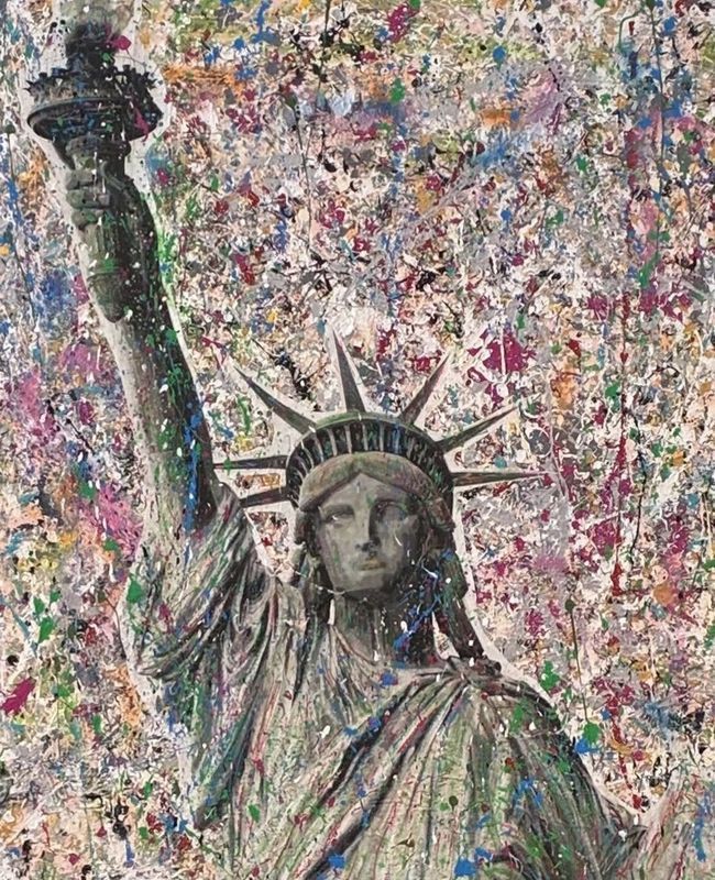 Statue of Liberty against a colorful splattered paint background