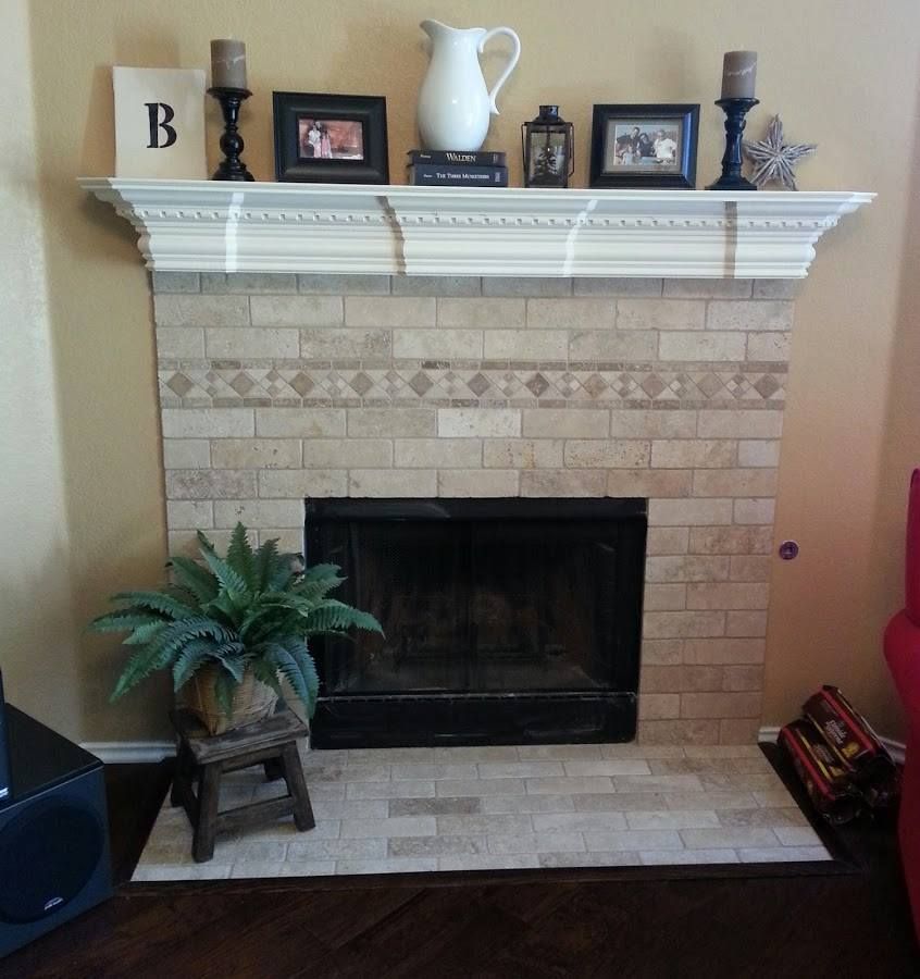 A living room with a fireplace and a sign that says b