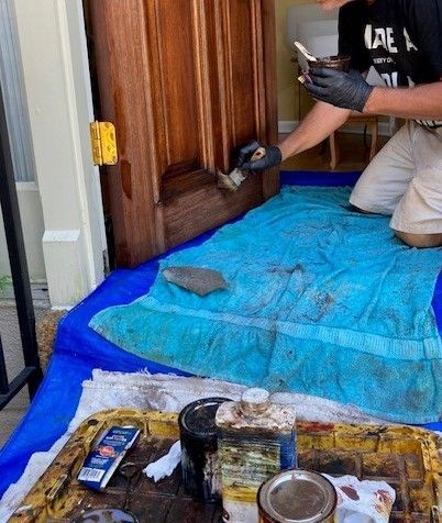 Applying Final Coating | Mid South Door Refinishing Nashville, TN