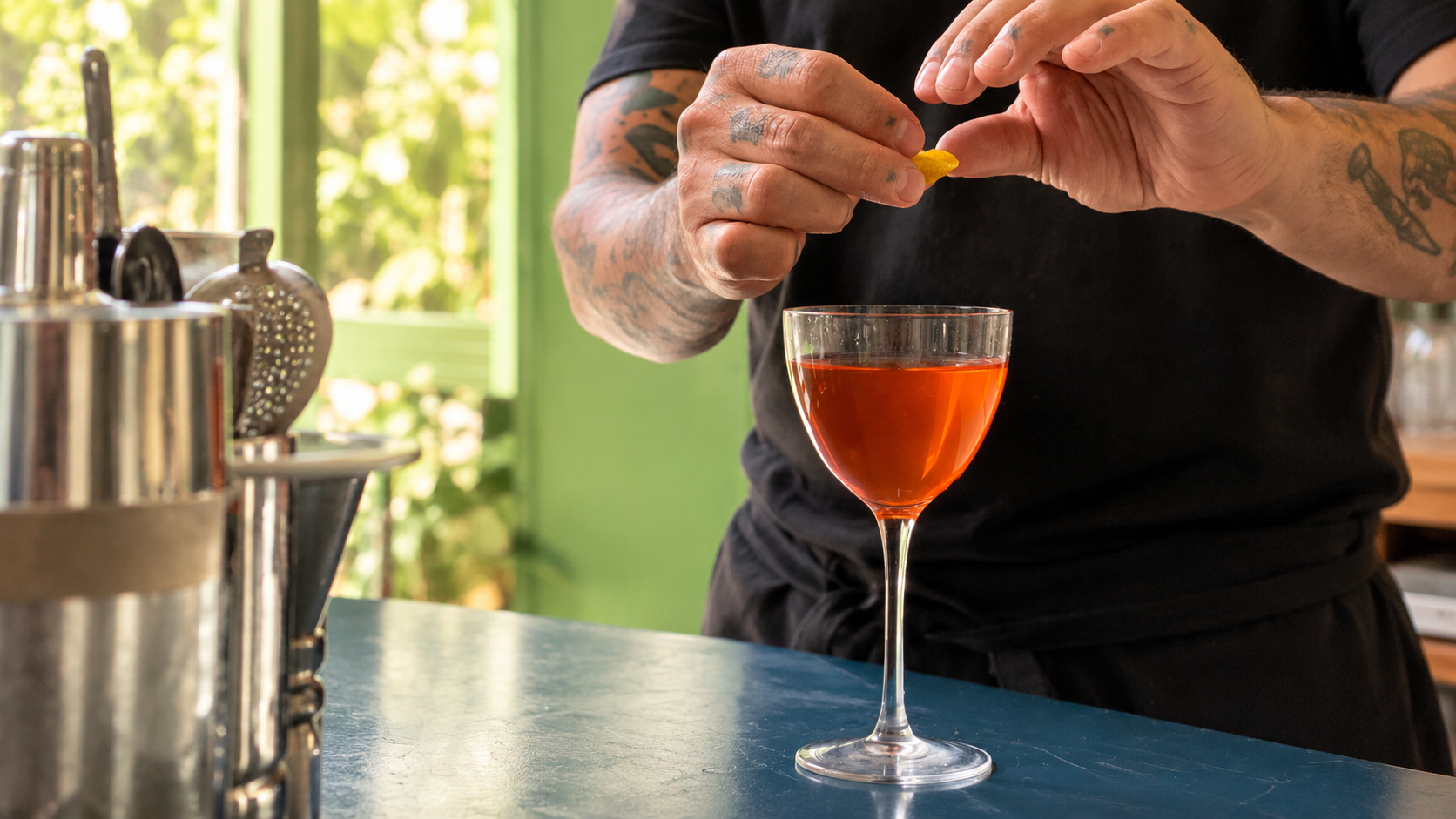 Mixologist preparing a cocktail during a Mexican mixology experience in Mexico City.