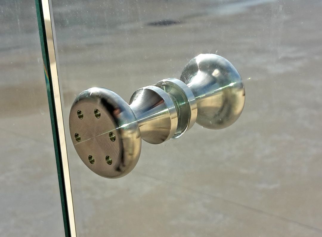 Pomello movimentazione vetrata pieghevole