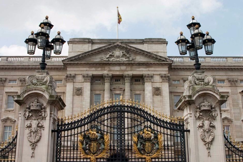 A large building with a gate in front of it.