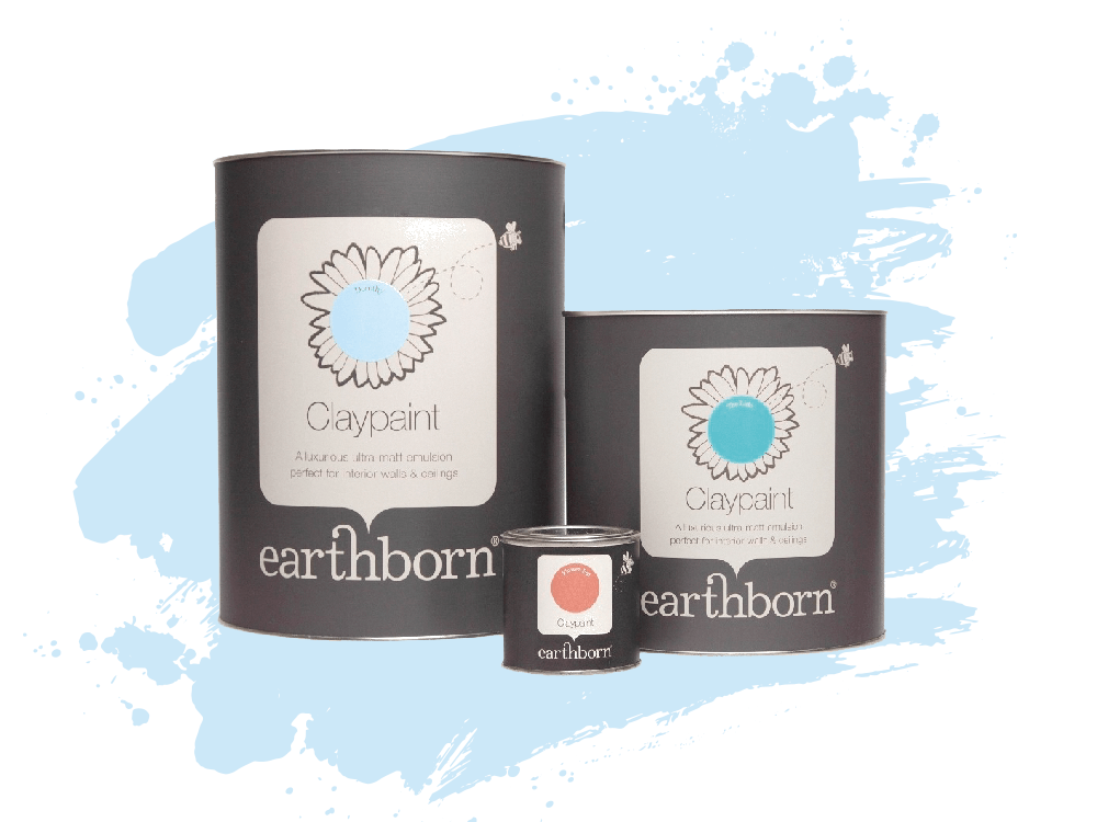 Three containers of earthborn paint are sitting next to each other on a white background.