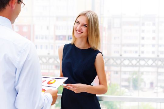 woman talking to the office worker
