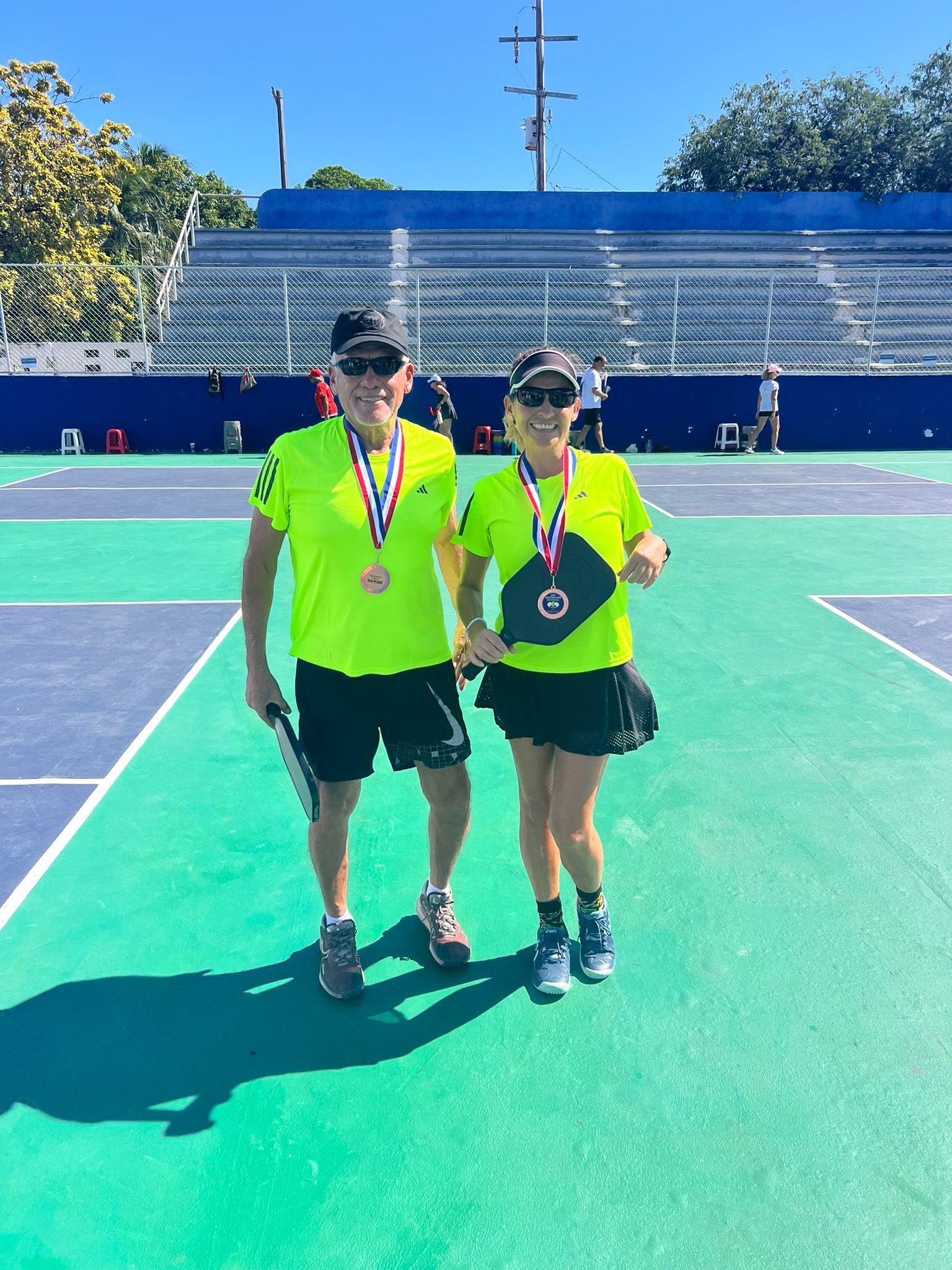 2 winners of a picklball tournamenr in playa del carmen, mx