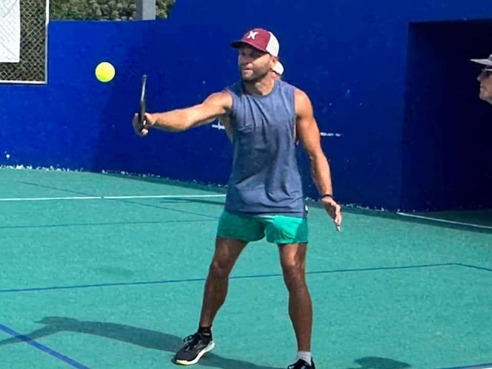 male playing pickleball in playa del carmen, mx