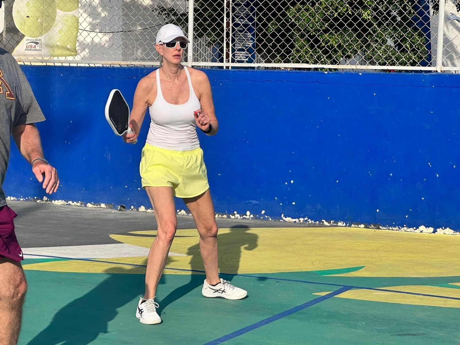 woman playing  pickleball in playa del carmen, mx