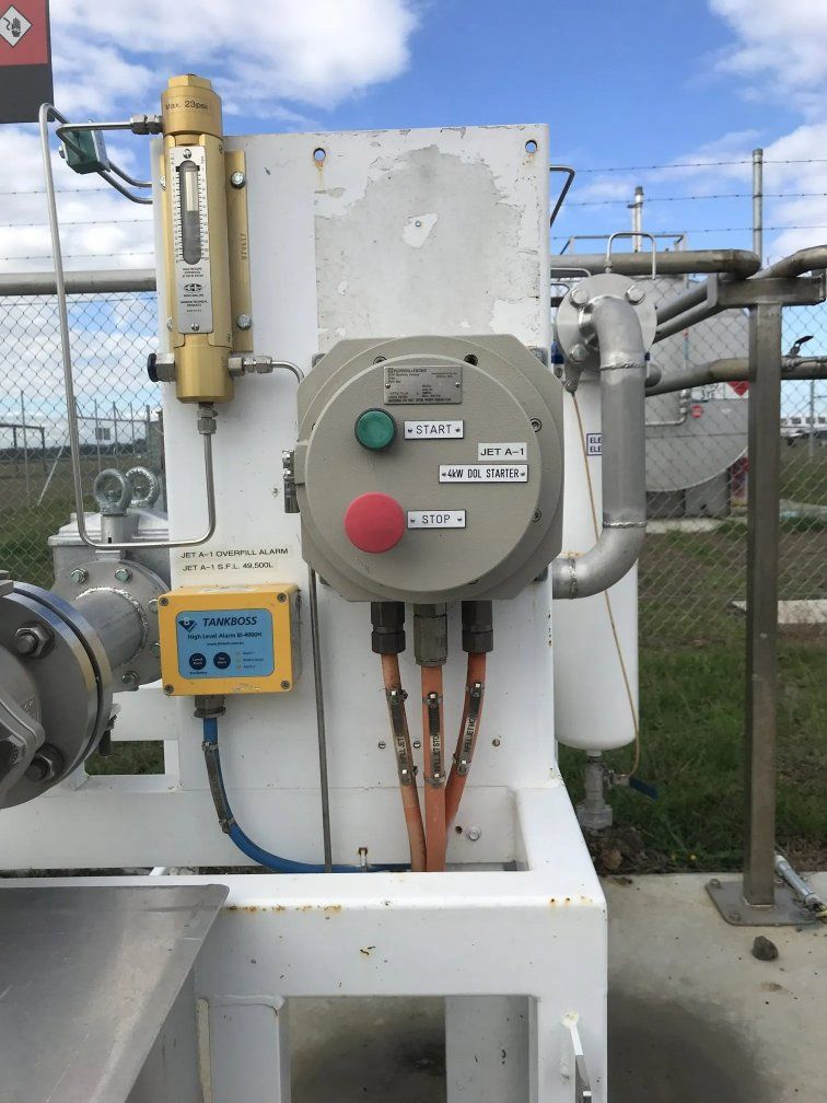 A Gray Box With a Red Button — Ray Smith Electrical in Korora, NSW