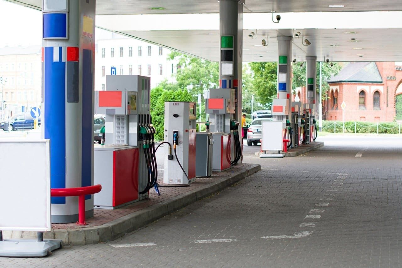 A Row of Gas Pumps in an Empty Gas Station — Ray Smith Electrical in Korora, NSW